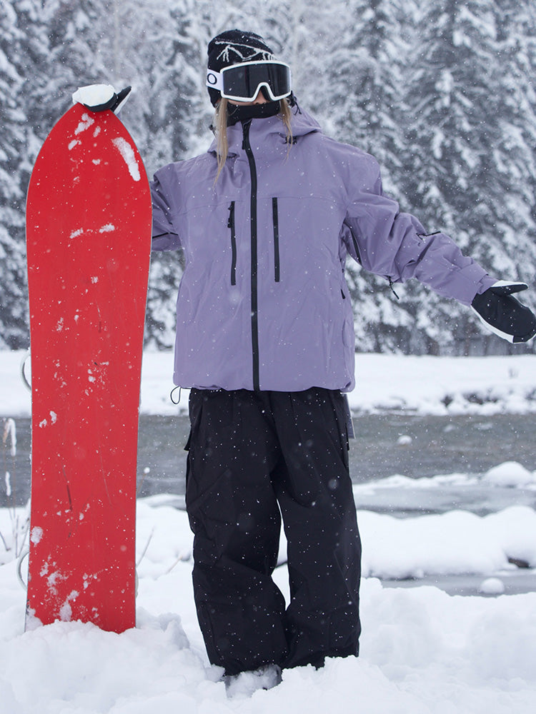 Women's white thermal snow suit waterproof 15K breathable one-piece with connected hood and cargo pockets