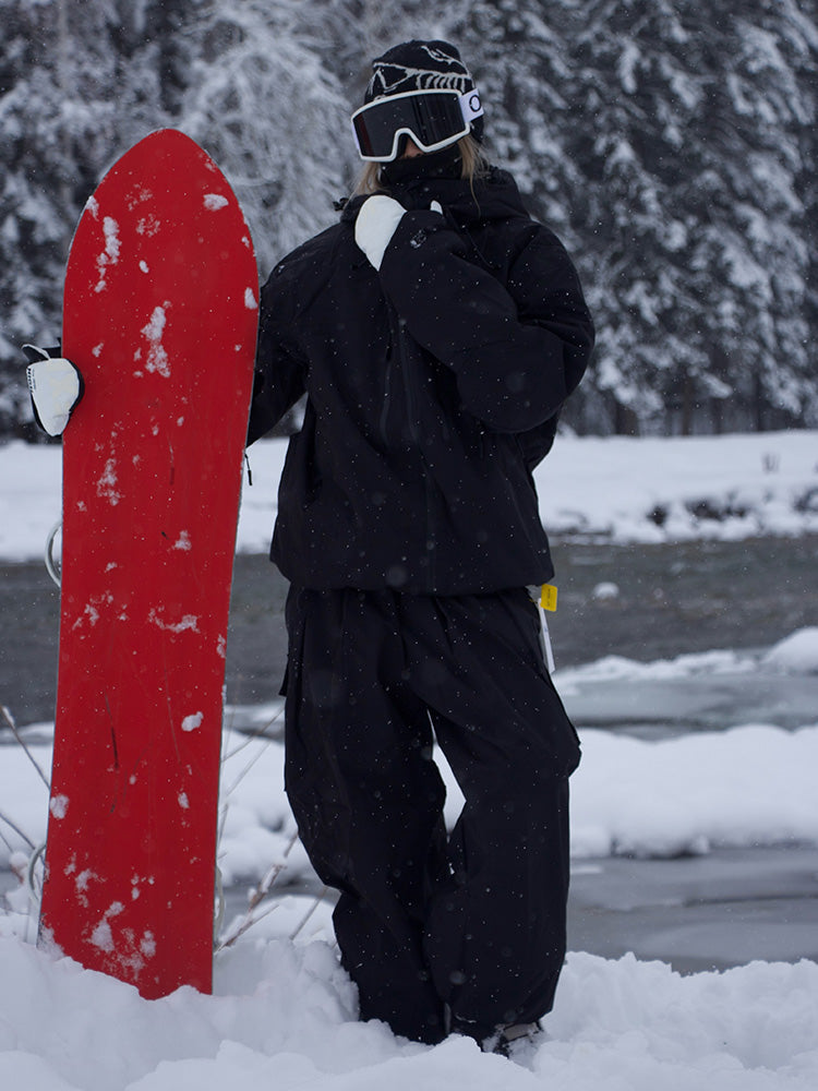 Women's white thermal snow suit waterproof one-piece with connected hood and cargo pockets
