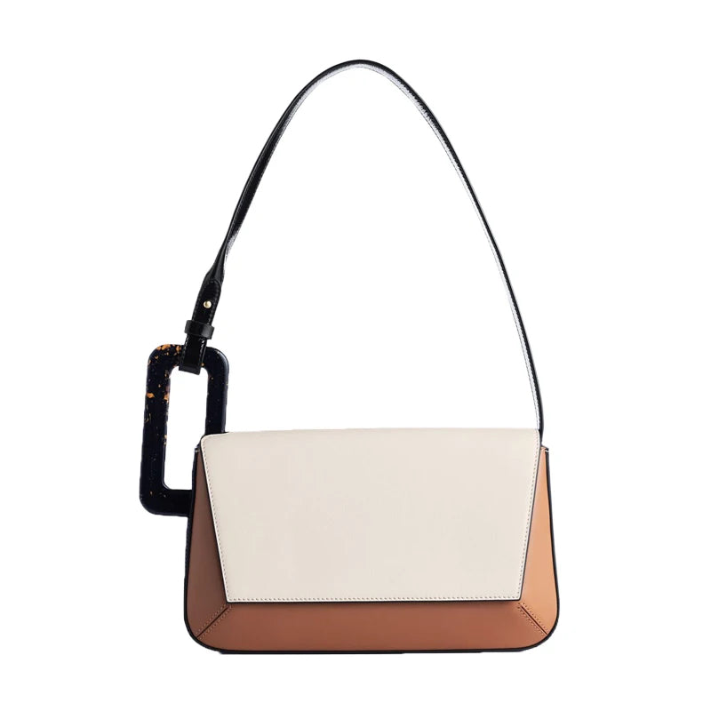 Prism colorblock shoulder bag glossy vegan leather angular flap sculptural resin buckle city style