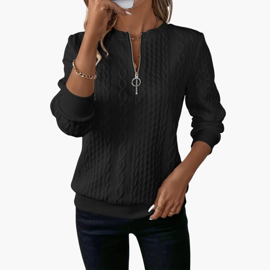 Women's cable knit pullover sweater with front zip neckline, long sleeves, ribbed cuffs, cozy classic fit
