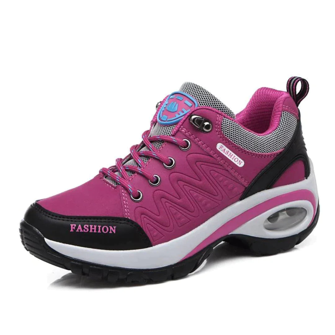 Women's Poly hiking shoes in pink synthetic leather with modern silhouette and all-day comfort support