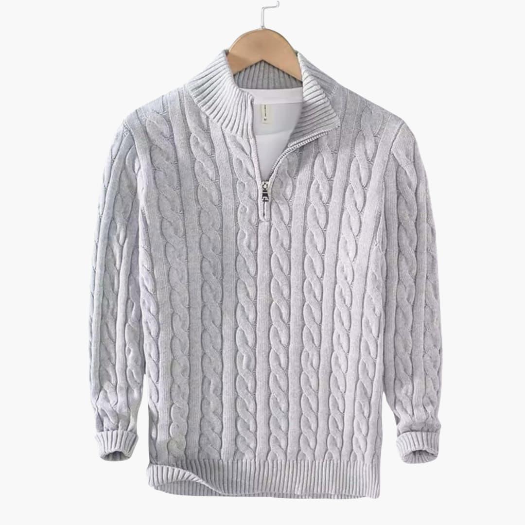 Men's cream cable knit half-zip sweater with ribbed stand-up collar and classic textured pattern