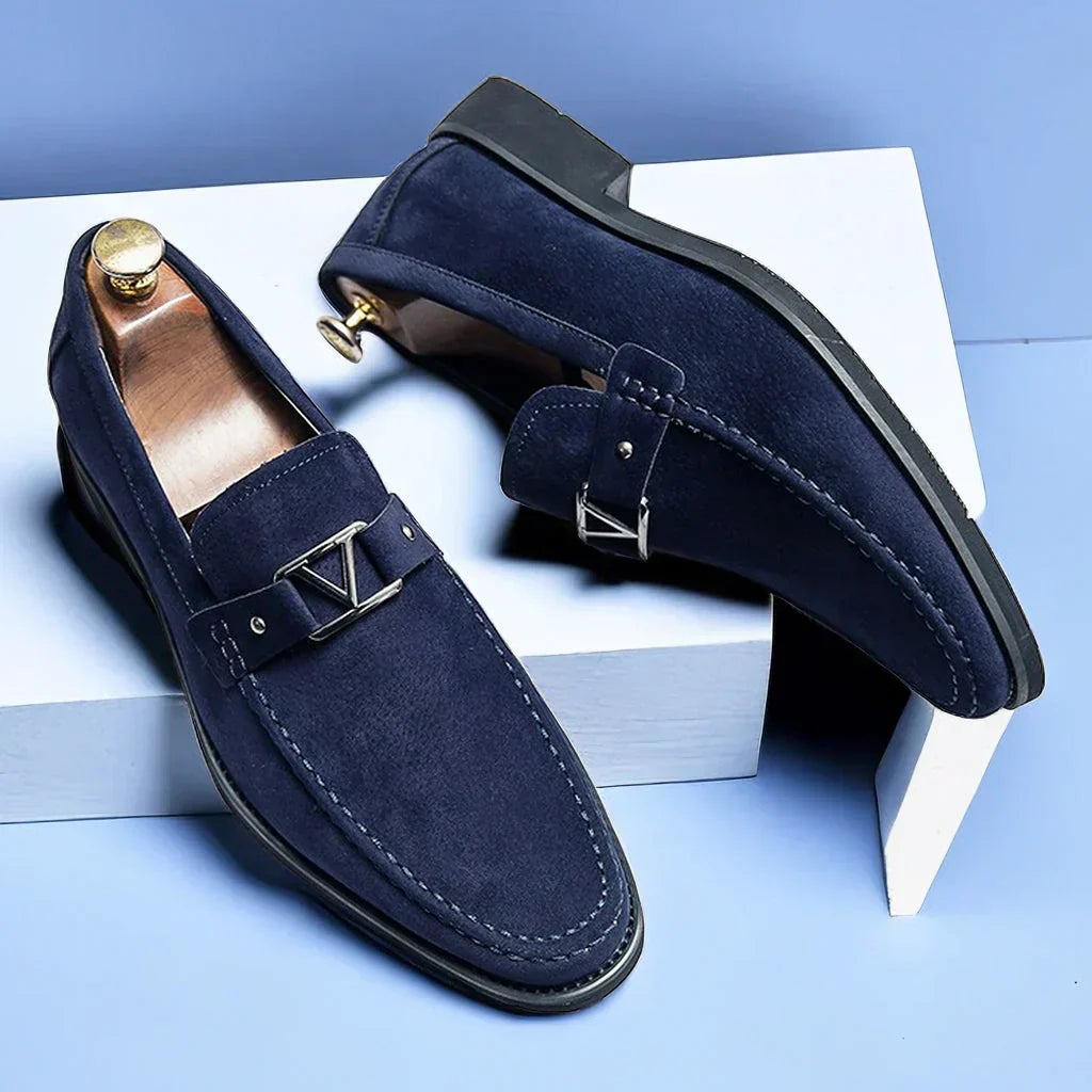 Men's black vegan suede slip-on loafer with decorative buckle and non-slip rubber sole