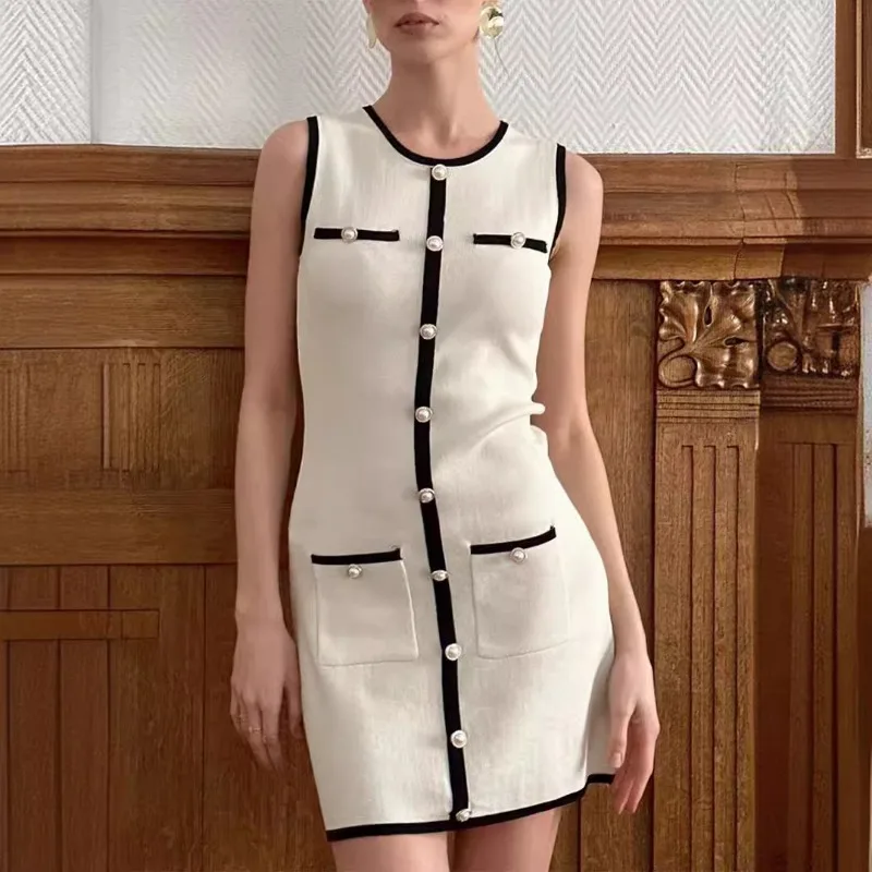 White button-trim mini dress with structured silhouette and tailored chic detailing for women