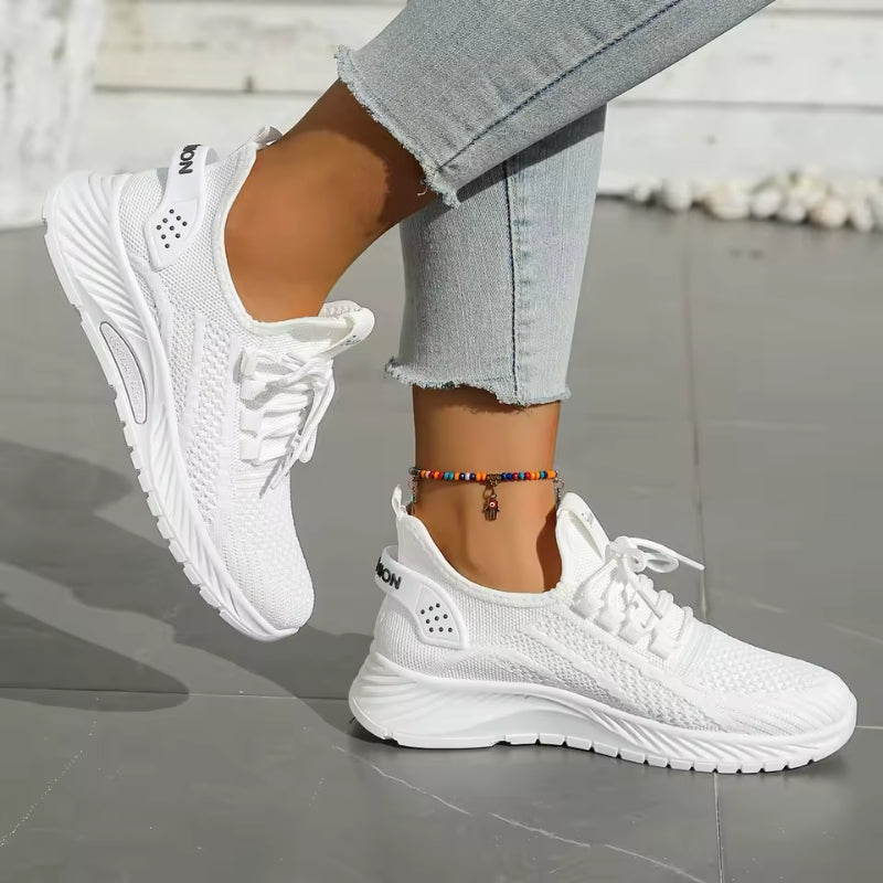 Women's orthopedic low-top athletic sneakers with breathable mesh upper and supportive cushioned sole