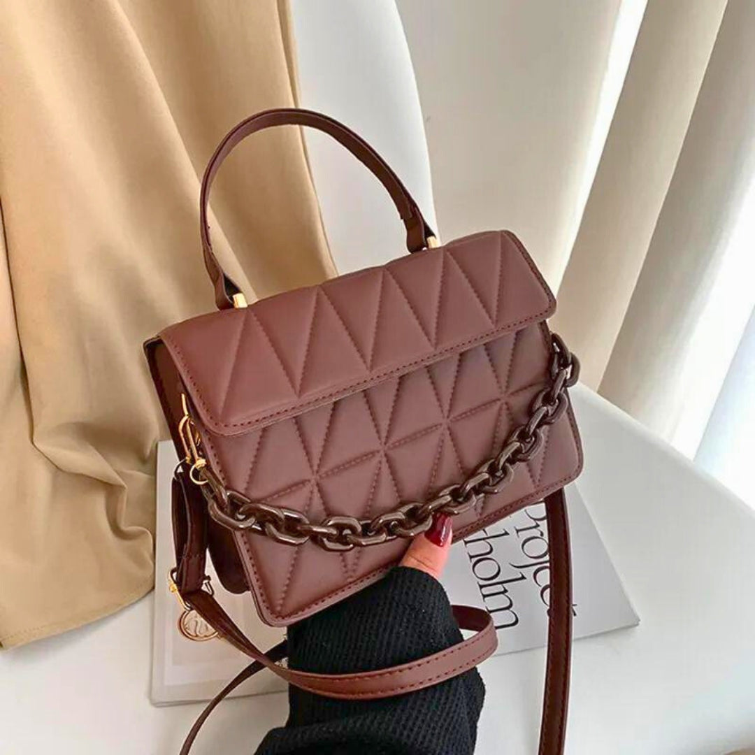 Nerys quilted handbag with bold gold chain handle, chic timeless design for everyday fashion