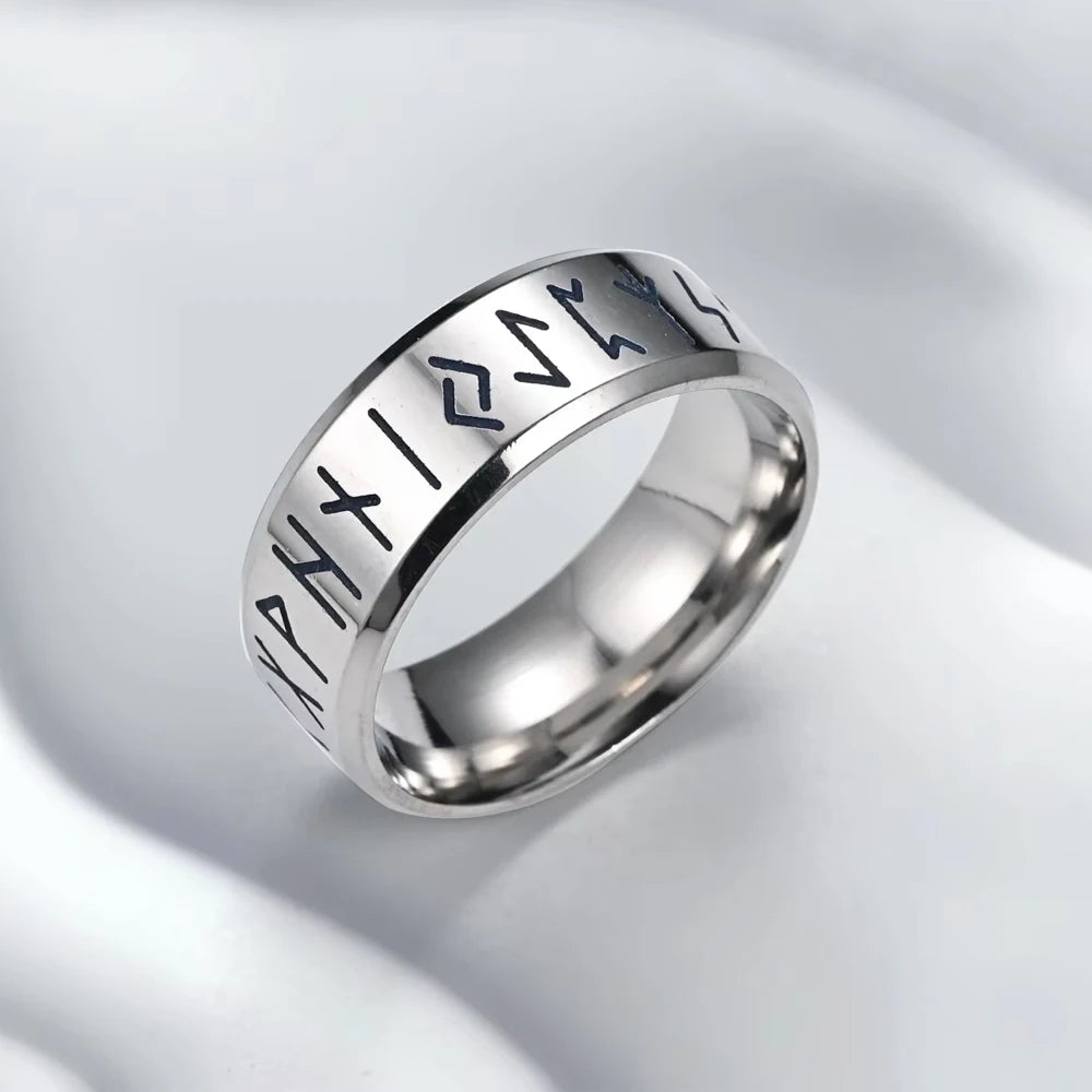Unisex 8mm stainless steel band ring with deep-carved ancient runes and stone-hammered finish