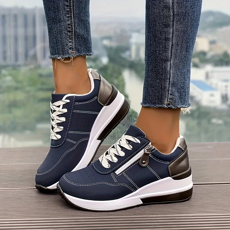 White urban comfort sneakers with sleek sporty silhouette and cushioned sole for all-day city wear