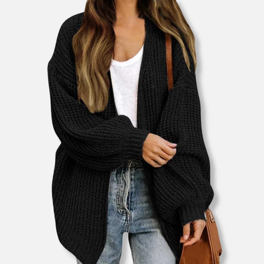 Women's oversized knit cardigan with voluminous lantern sleeves and ribbed cuffs for chic layering