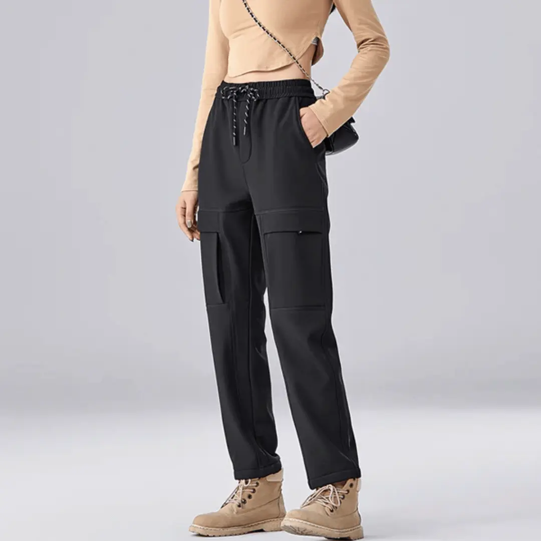 Men's weatherproof cargo pants with fleece lining, water-repellent shell, and adjustable waistband