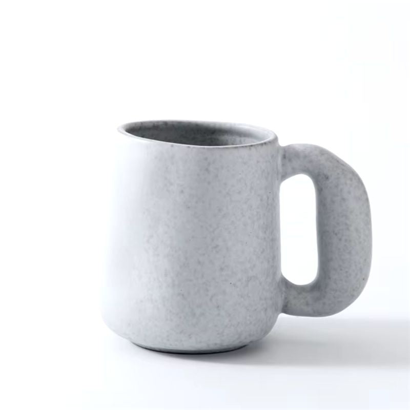 Terra handcrafted ceramic mug speckled glaze finish ergonomic grip rustic modern design for tea lovers