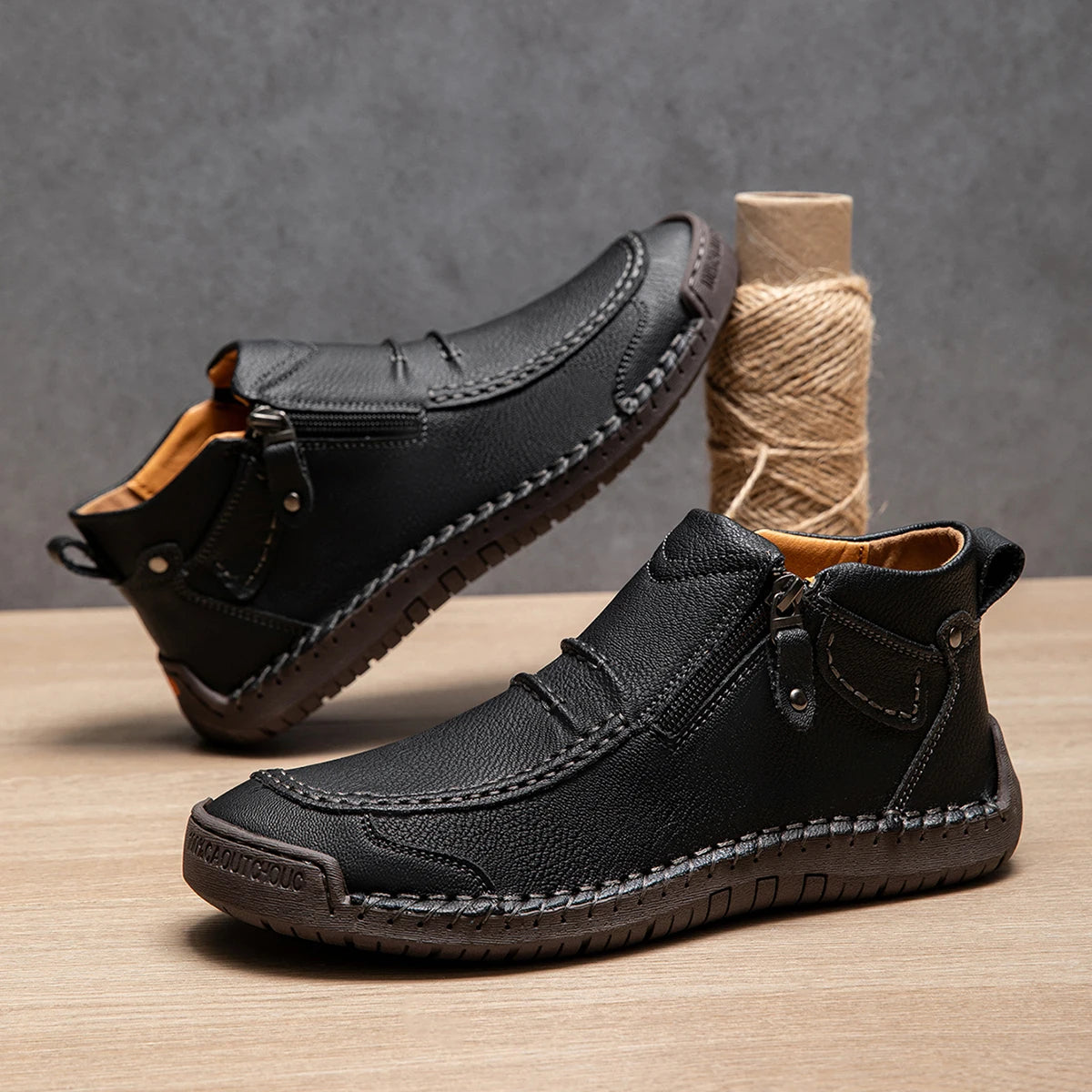 Women's vegan leather ankle boot with side zip, cushioned insole, and rugged textured outsole