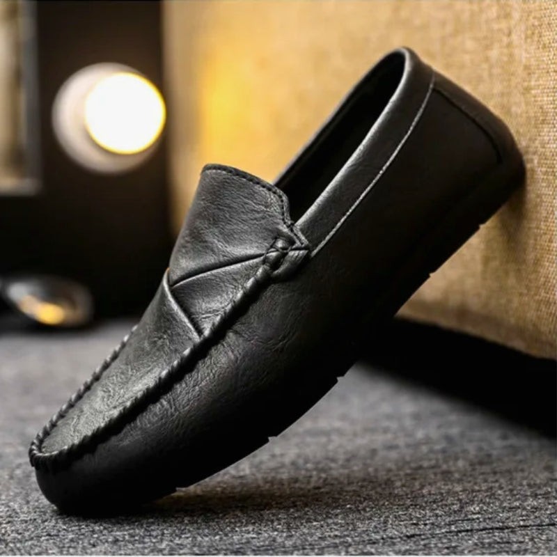 Elroy slip-on loafers with memory foam cushioning, breathable insole, and hand-stitched detailing