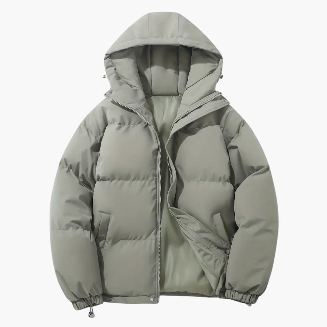Women's quilted hooded jacket with full zipper, side pockets, and adjustable hem drawstring