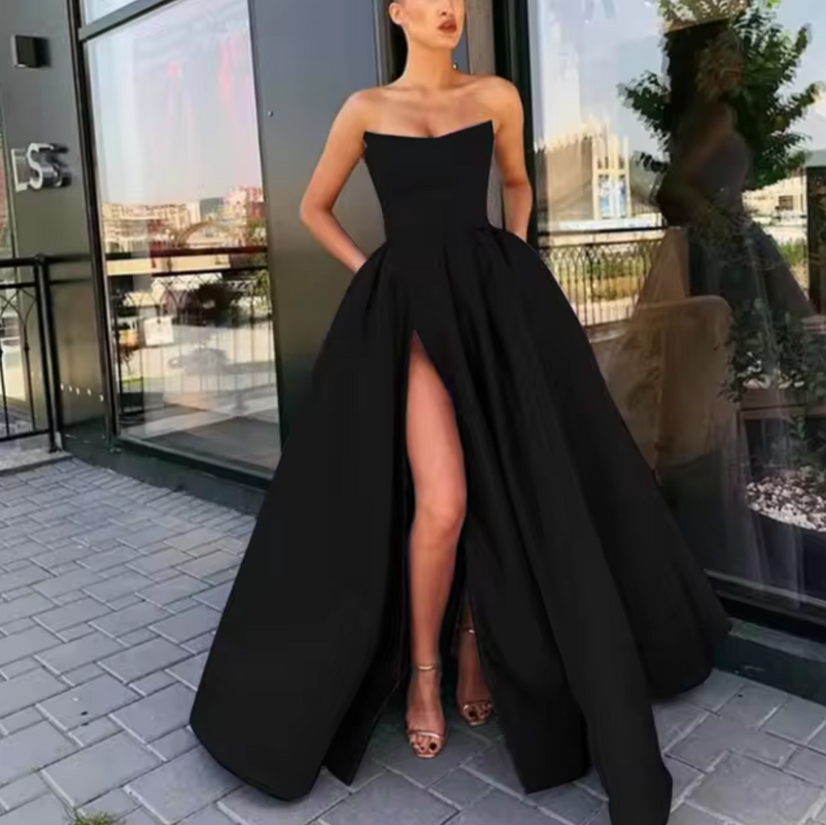 Women strapless A-line floor-length evening gown with high slit, elegant formal silhouette