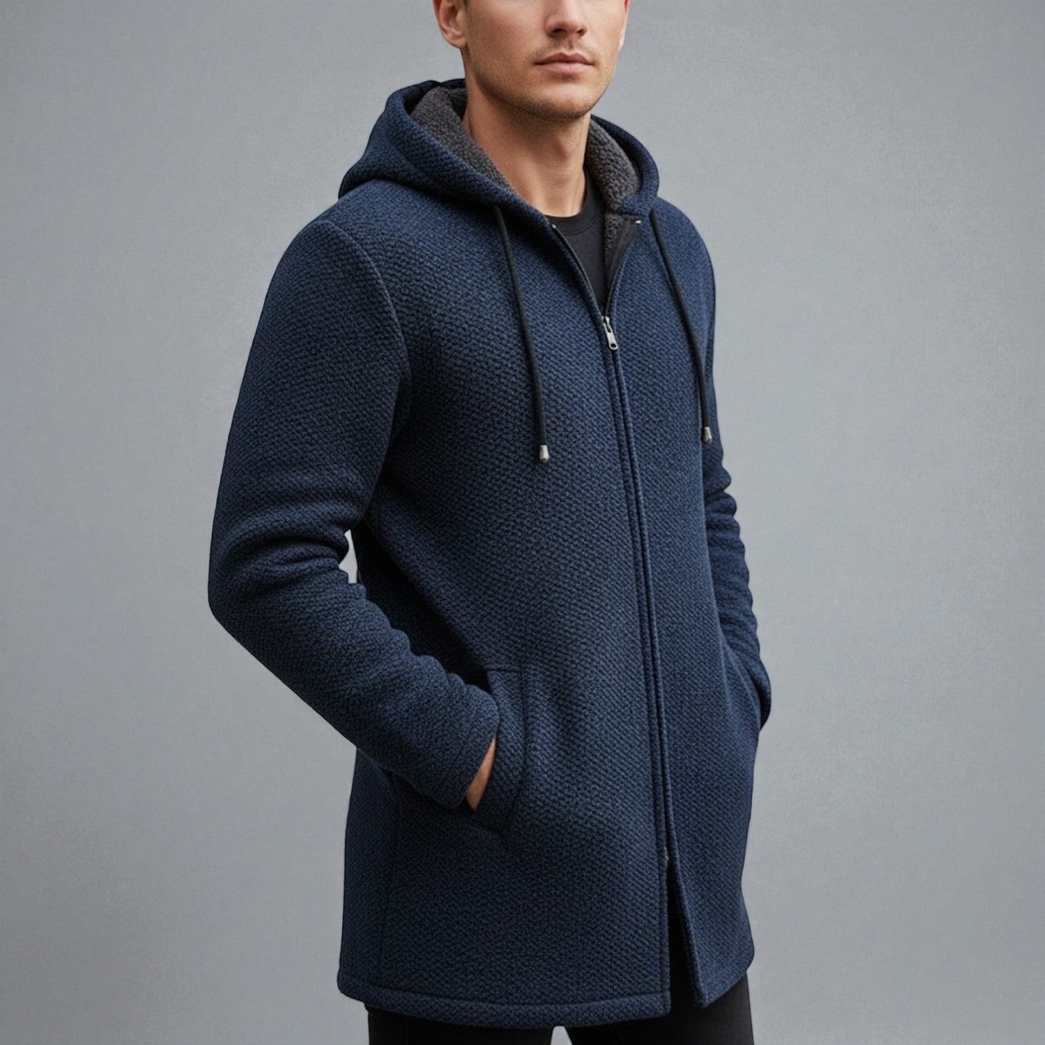 Men's longline fleece hoodie in neutral tone, regular fit with extended hem for casual winter warmth