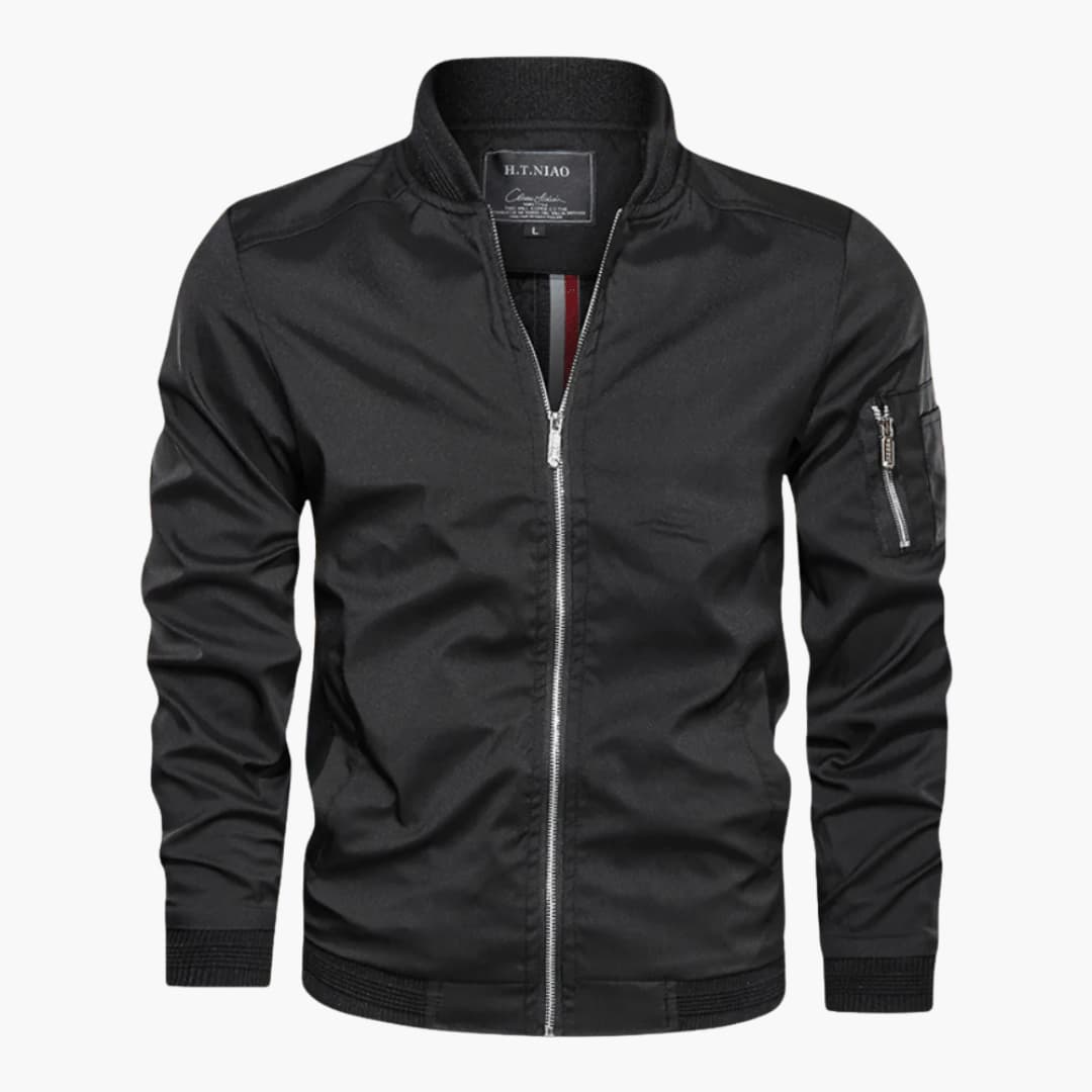 Men's black bomber jacket with ribbed collar, front zipper, and distinctive upper-arm zip pocket