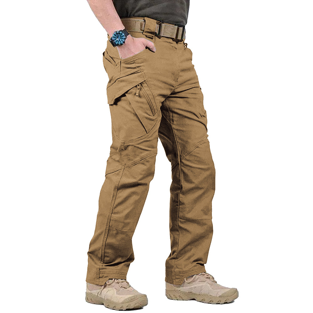 Men's relaxed fit cotton cargo pants in neutral tone with multiple utility pockets for outdoor wear