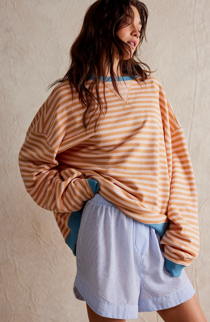 Women's oversized striped knit sweater relaxed fit vibrant multicolored cozy everyday style