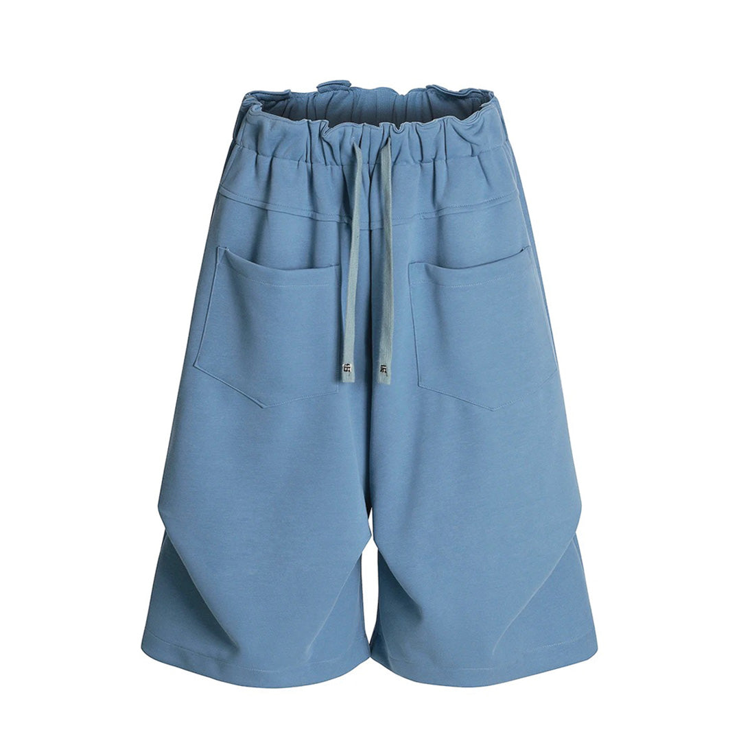 Men's relaxed knee-length cotton-blend shorts neutral tone refined detailing Riders Collection casual style