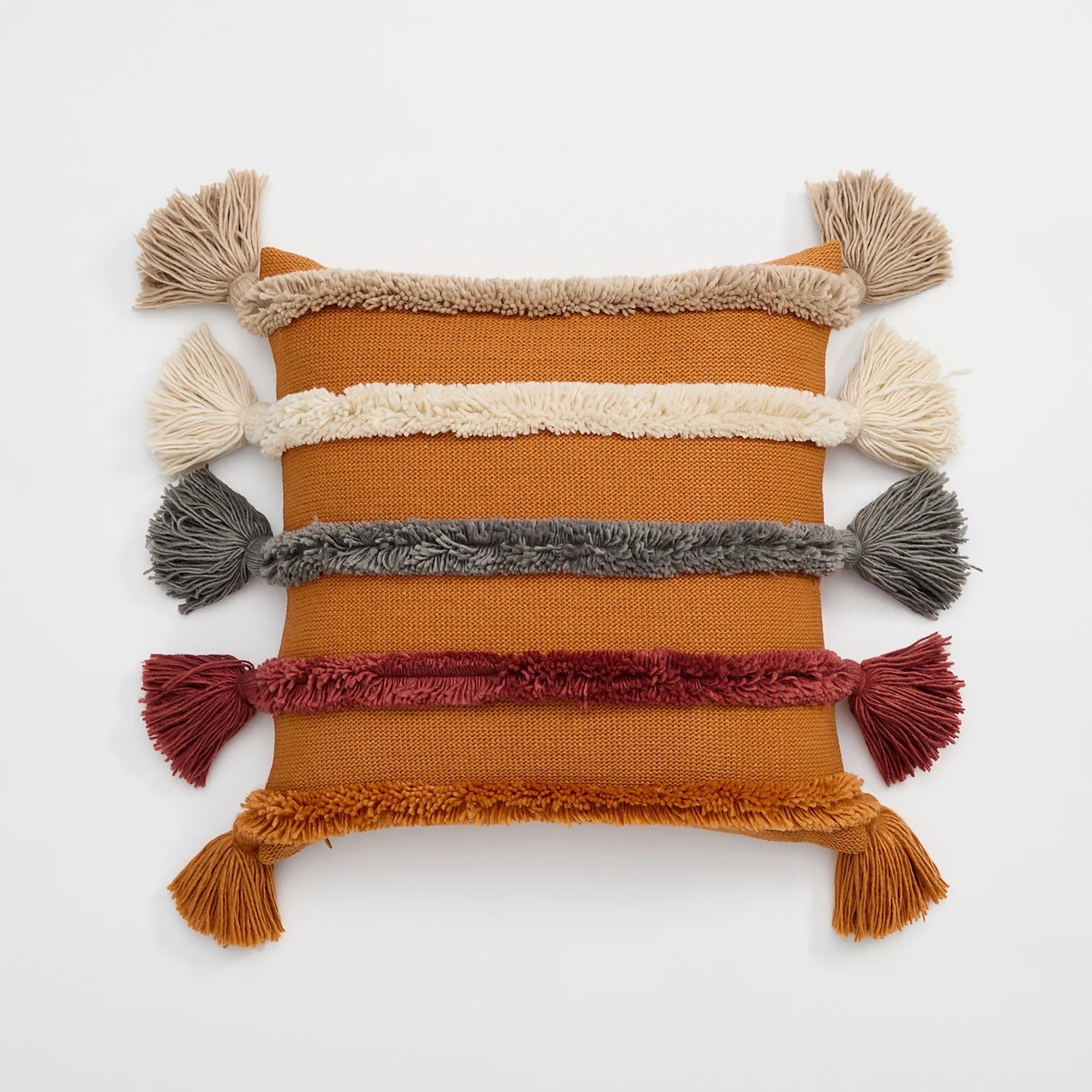 Boho tufted cushion cover with hand-tied tassels, bold pattern, perfect for sofa or bed decor