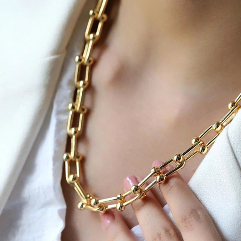 Lumiere gold link necklace and bracelet set, gold-plated stainless steel, contemporary elegance