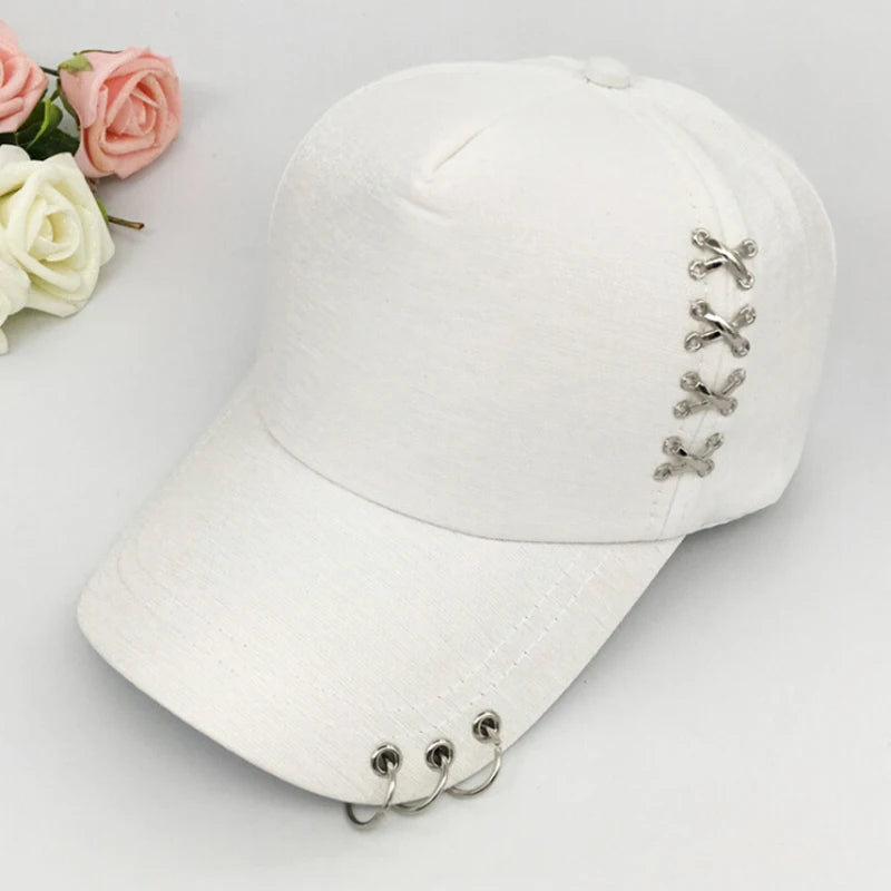 Unisex black structured cotton cap with stainless steel lace-up hardware and triple front ring detail