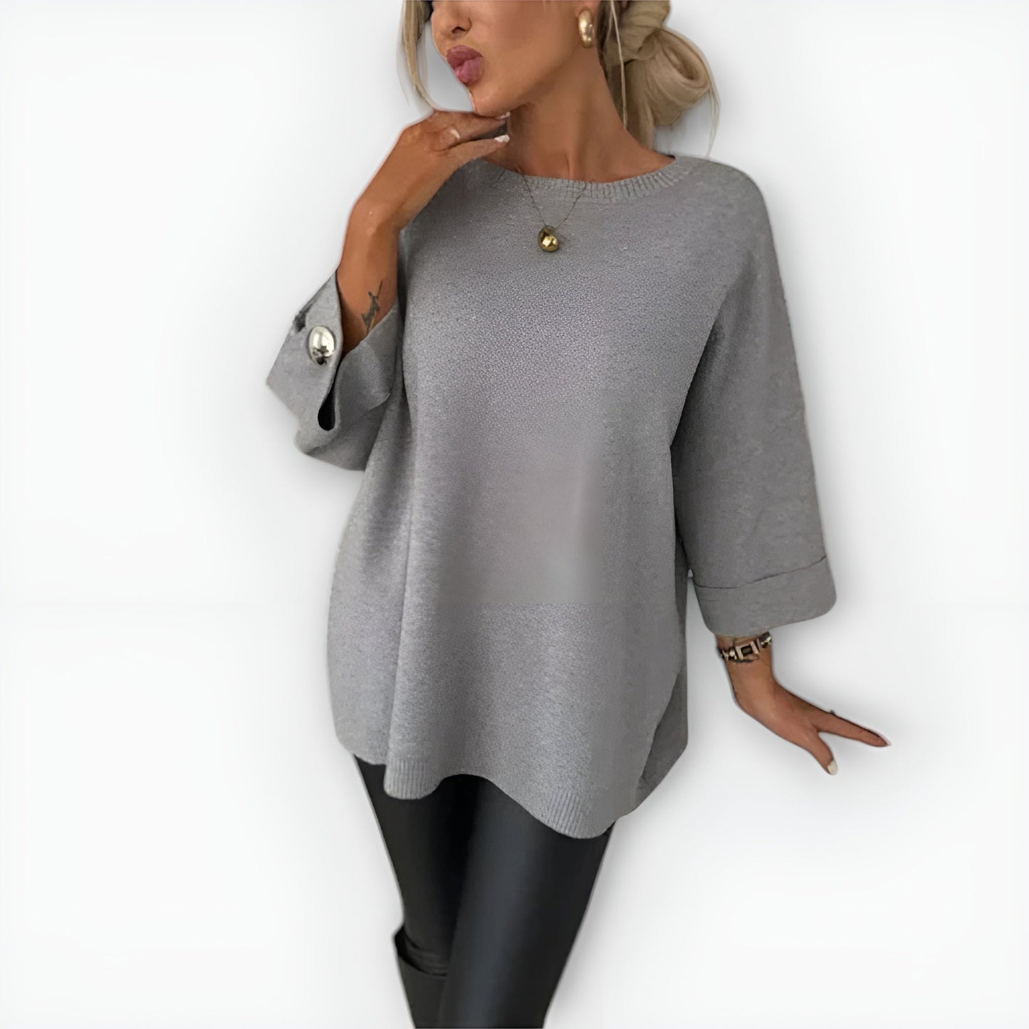 Women's oversized cream knit sweater relaxed fit fluid drape with button-accent sleeves