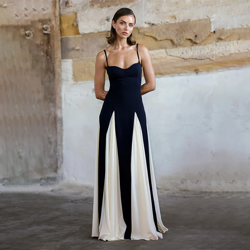 Women's two-tone evening gown fitted bodice dramatic flowing panels formal elegant silhouette