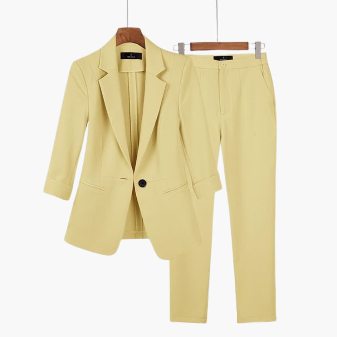 Women's tailored blazer and trousers suit set in solid color with notched lapel single-button closure