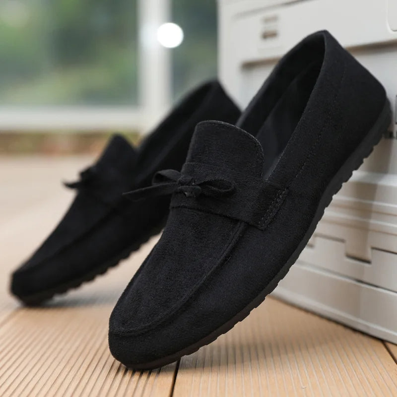 Women's suede bow loafers slip-on style with anti-slip rubber sole in neutral casual design