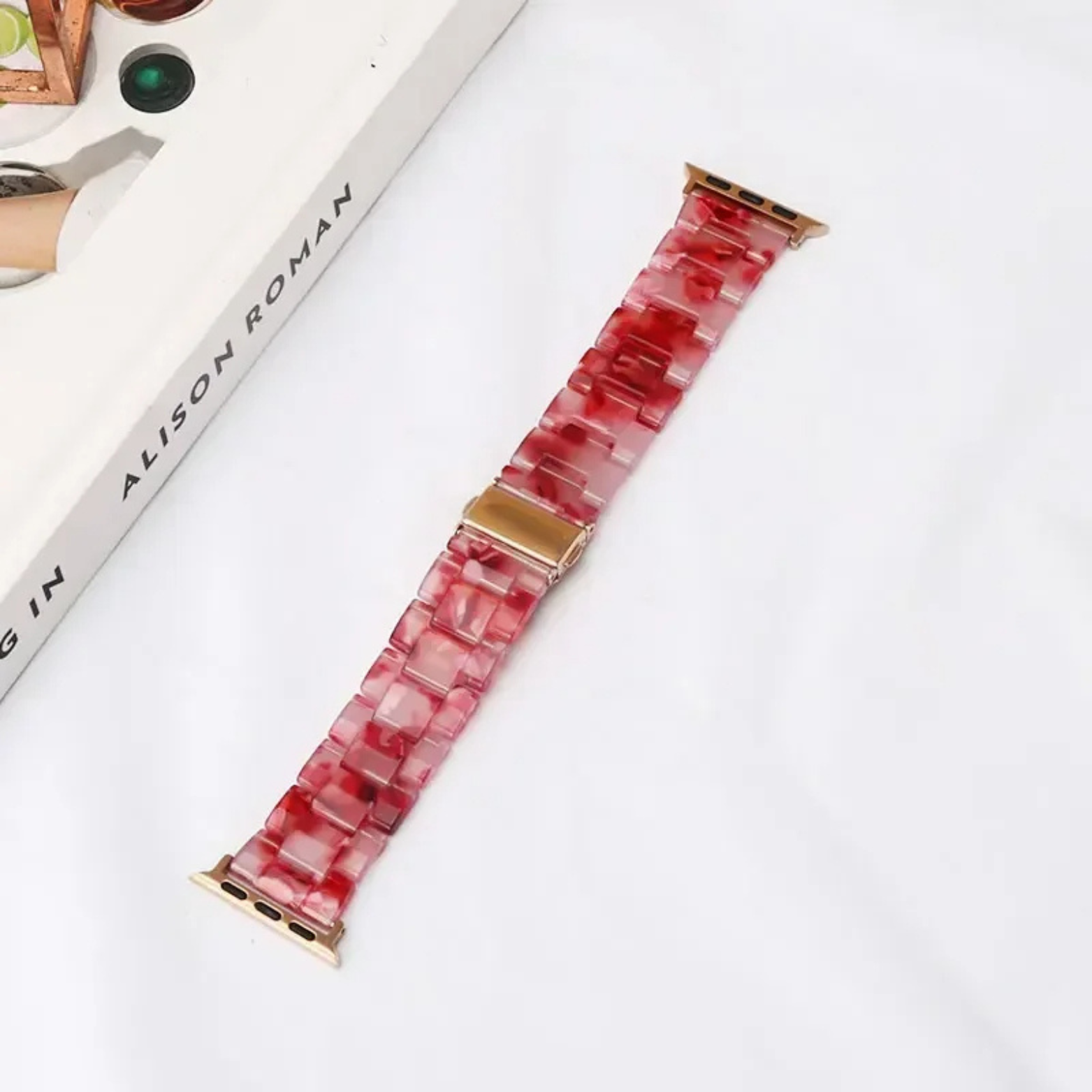 Bold marbled resin Apple Watch band with luminous high-gloss finish and scratch-resistant adjustable links