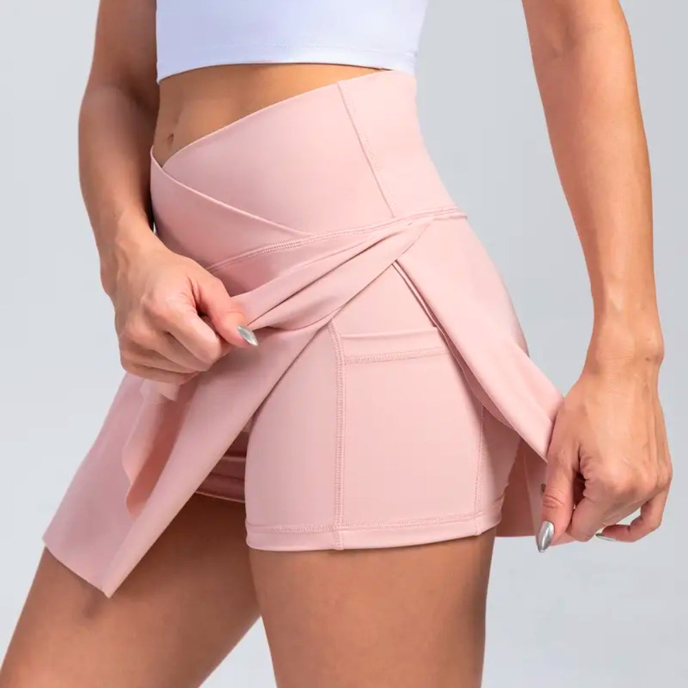 Women's black high-waist flared mini skirt with smoothing compression fit and built-in shorts