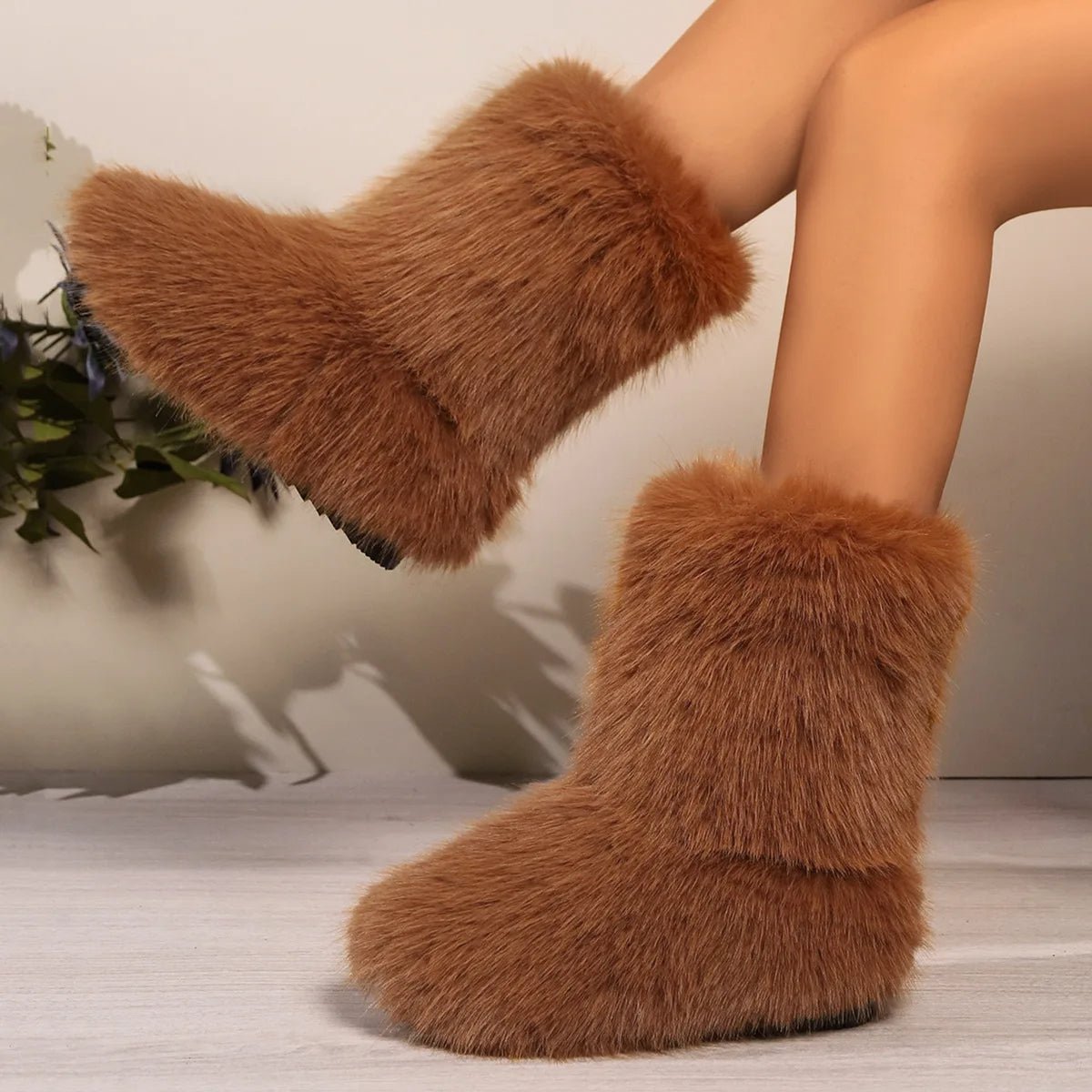 Black faux fur mid-calf slip-on boots with plush exterior and anti-slip sole for women