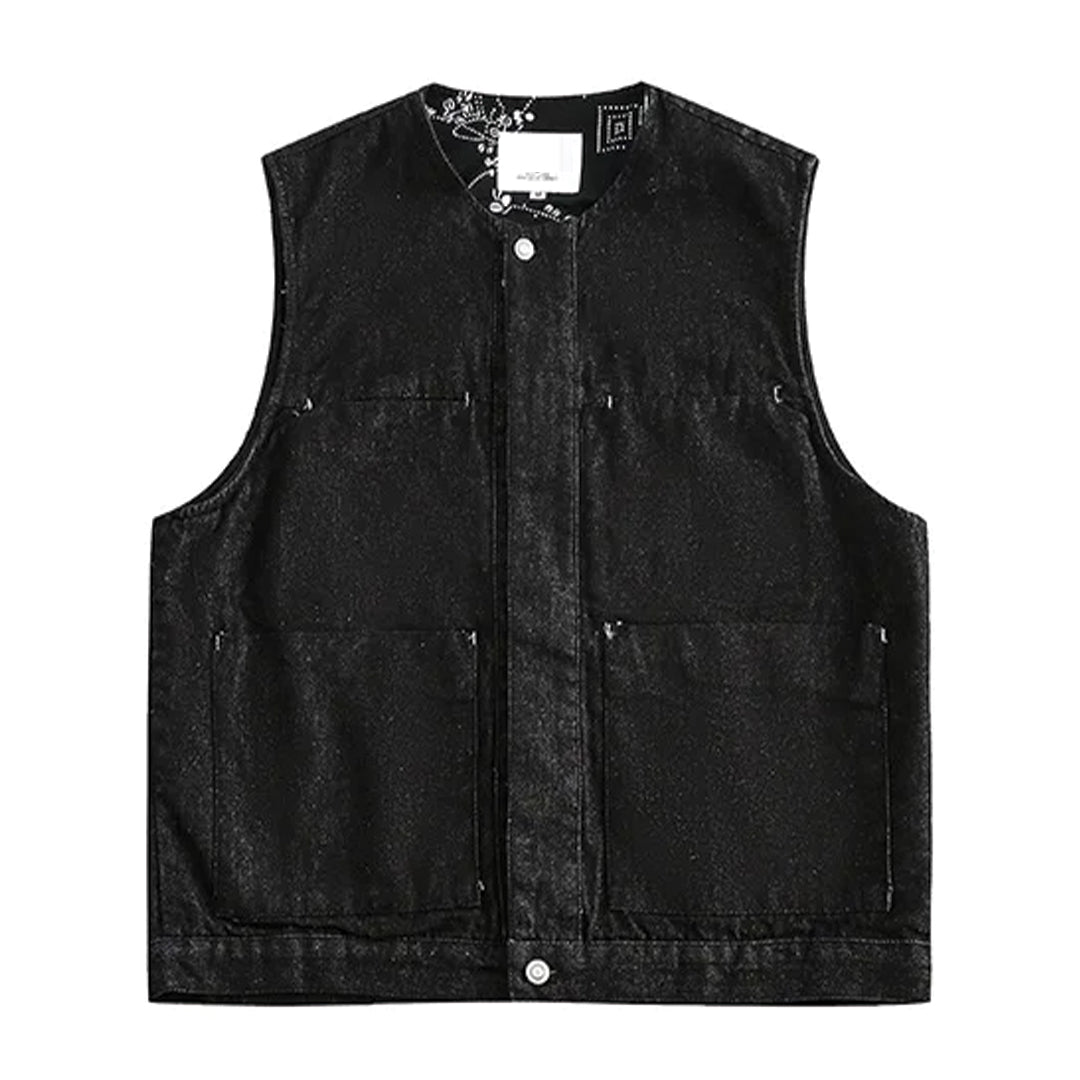Structured denim tooling vest with riveted four-pocket design, crisp layering fit for work and style