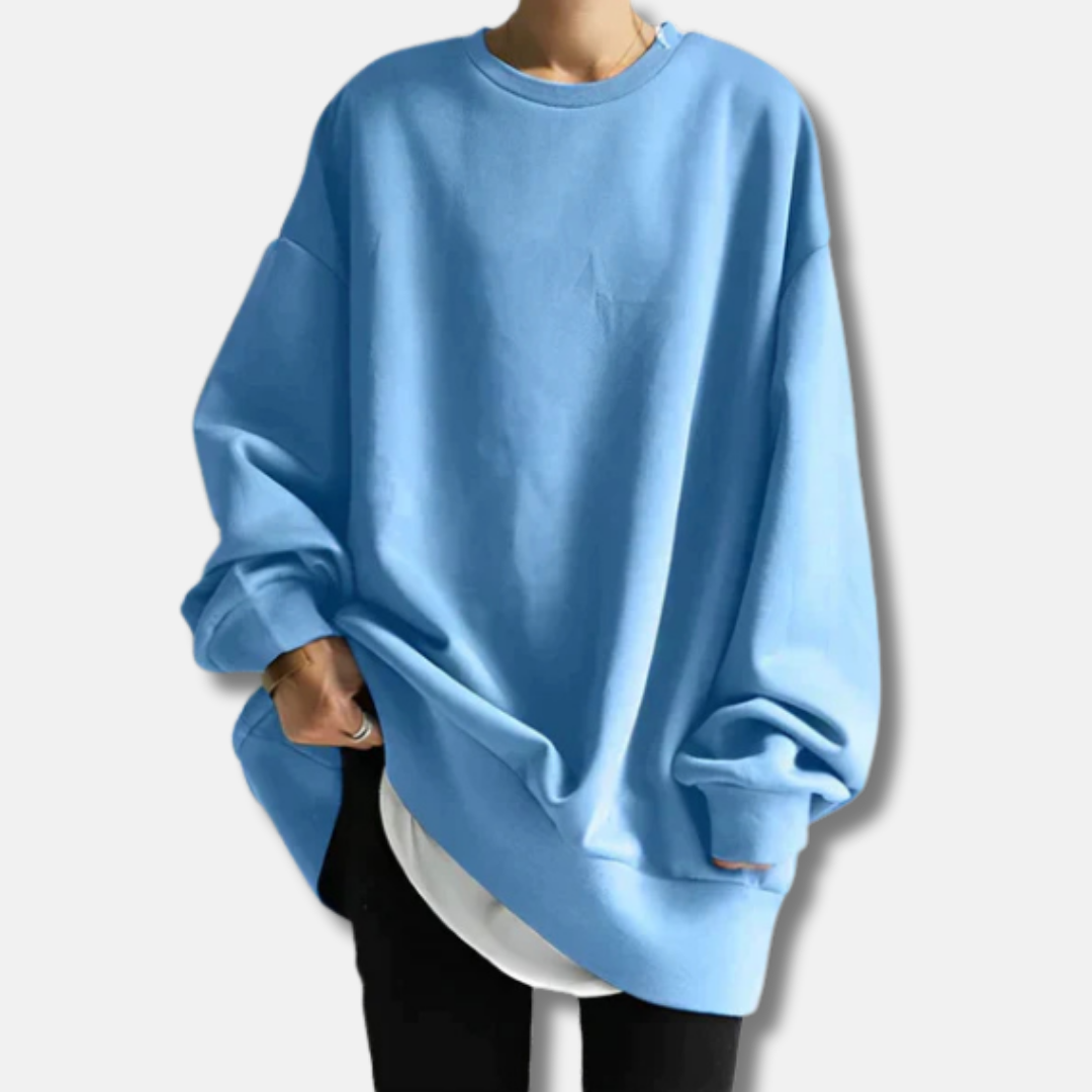 Women's soft knit oversized tunic-length sweatshirt in casual relaxed fit, perfect for layering