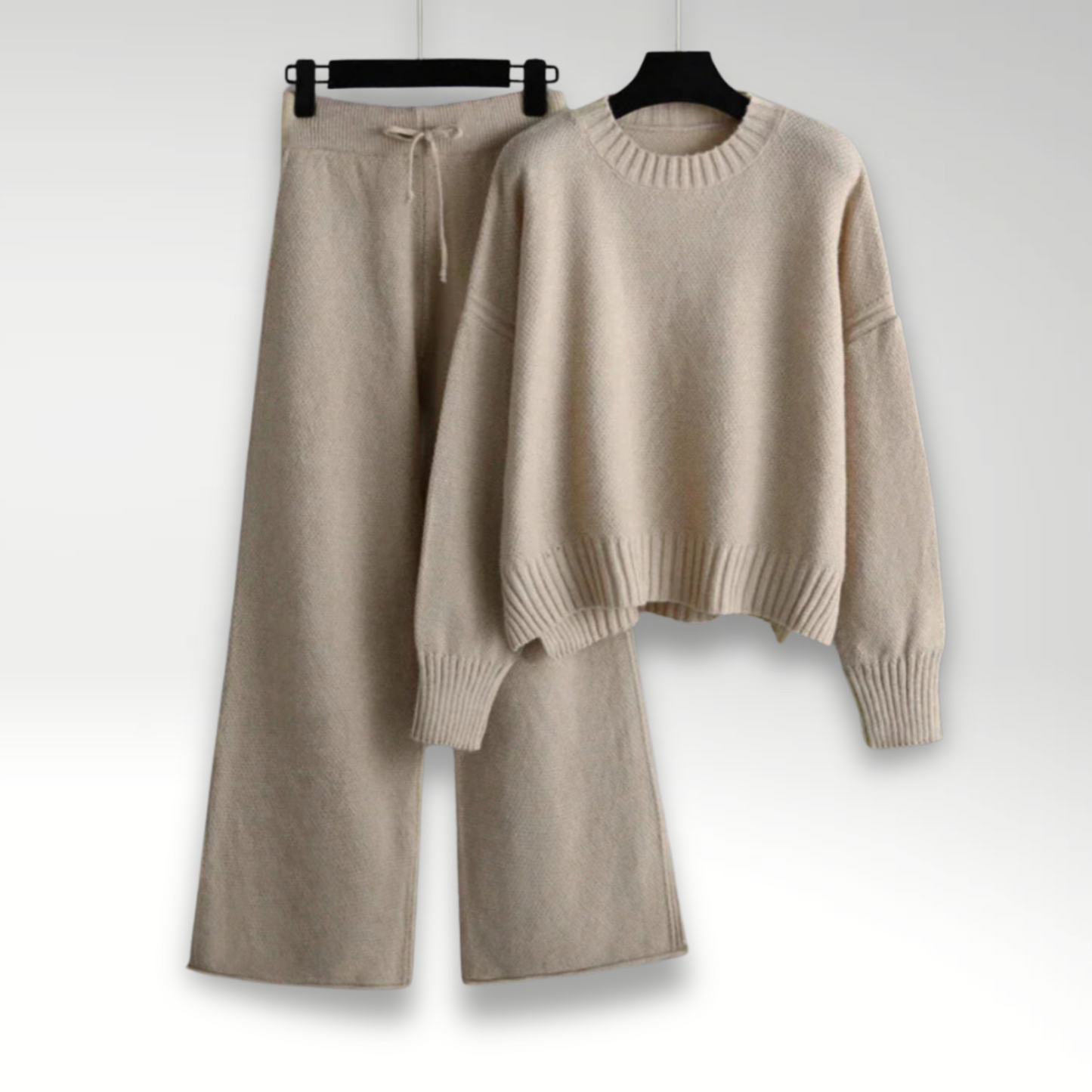 Women's luxury tricot two-piece drawstring outfit in neutral tones, soft flexible knit fabric