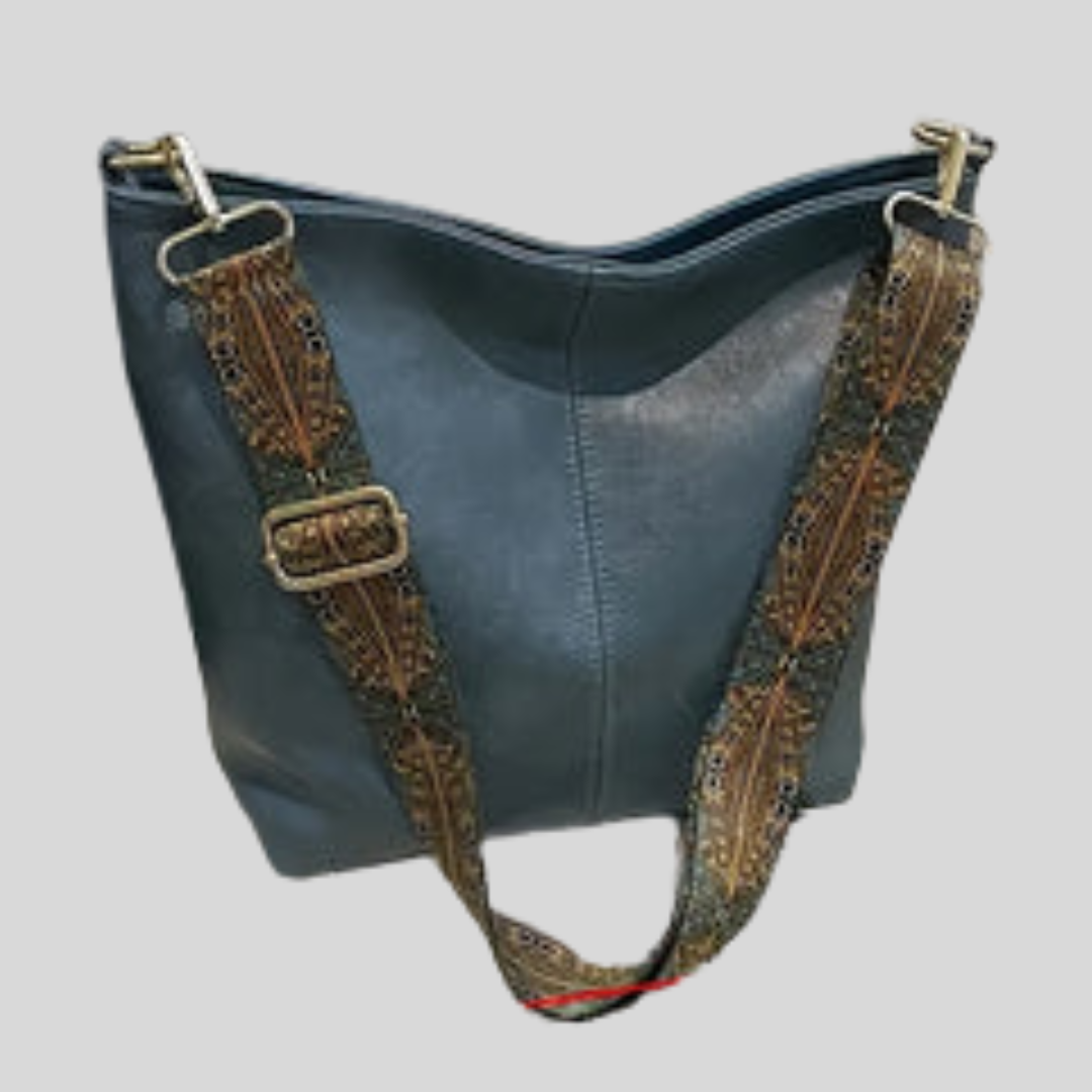 Women's everyday shoulder bag with wide adjustable strap, large interior pocket, versatile casual style