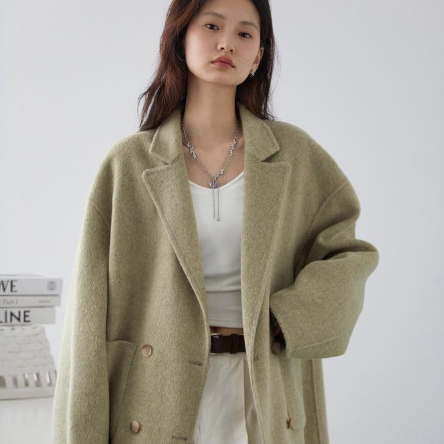 Oversized wool-blend trench coat double-breasted closure relaxed fit city-ready silhouette