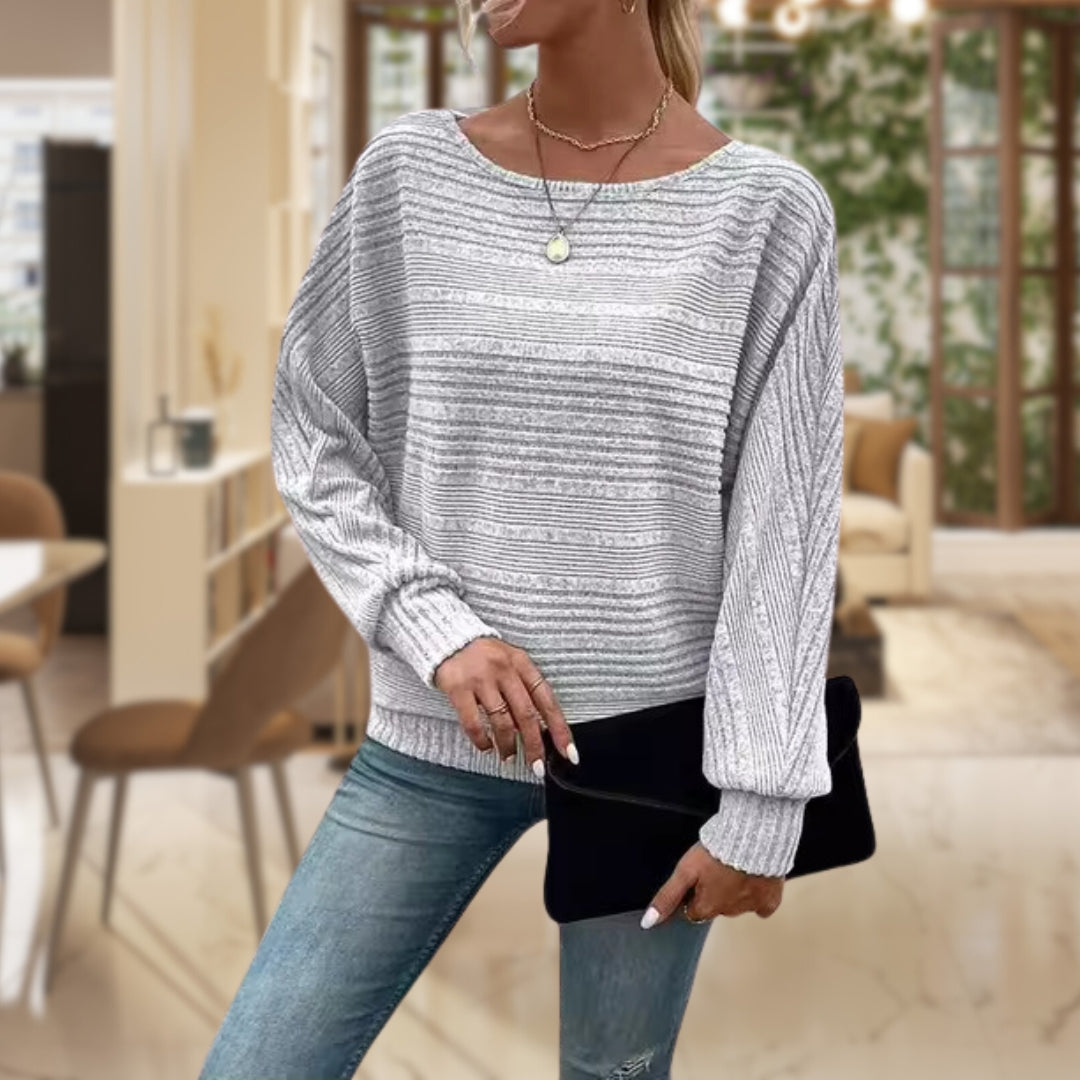 Women's cozy knit pullover sweater in warm tones, modern relaxed fit with soft wool fabric