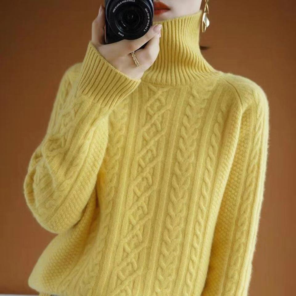 Women's loose-fit turtleneck sweater in premium soft knit with relaxed silhouette for cozy elegance