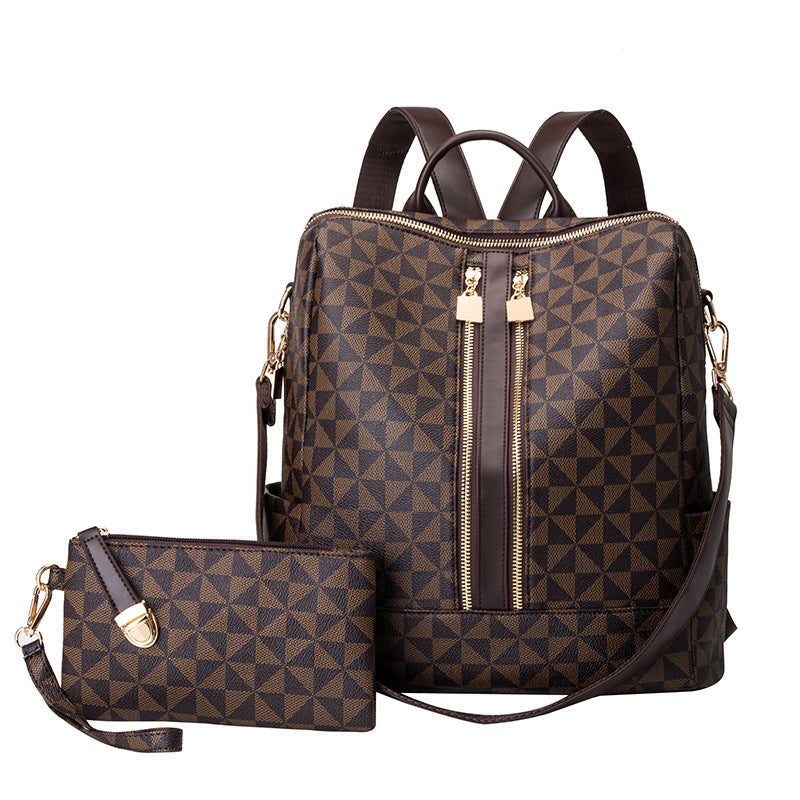 Black convertible anti-theft backpack transforms into handbag with hidden security zippers