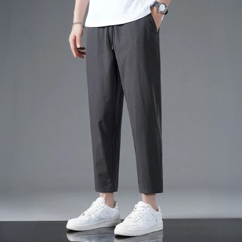 Black high-stretch activewear running pants with second-skin fit, moisture-wicking lightweight fabric