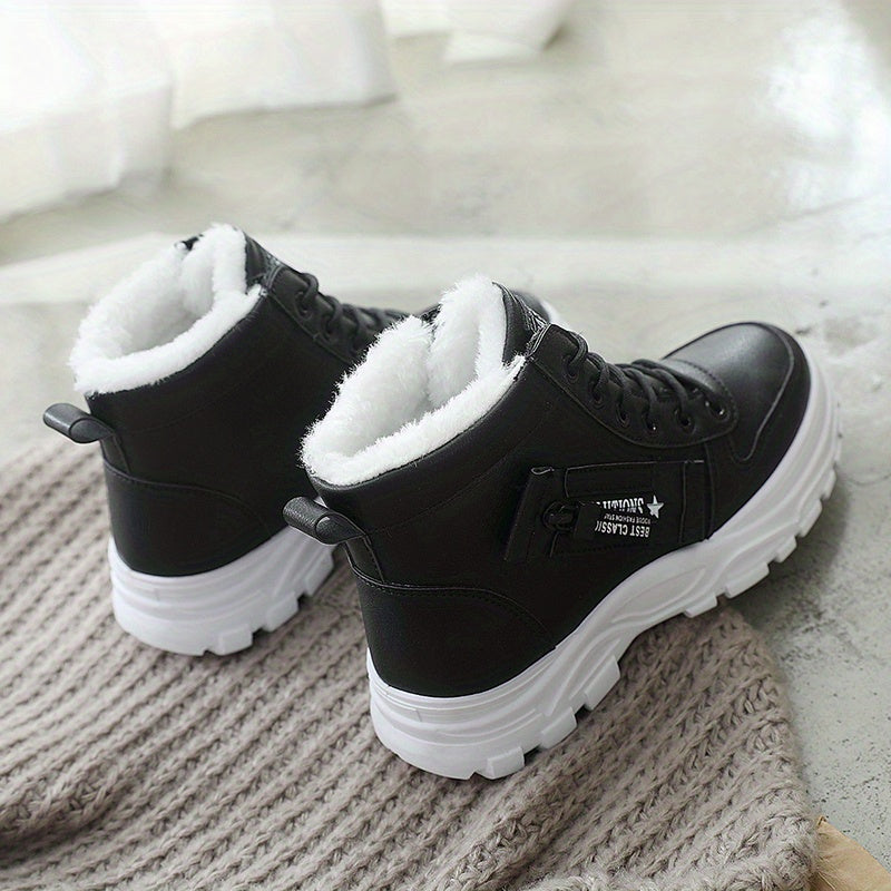 Women's winter lace-up boots with thick sole, padded interior lining for warmth and secure cold-weather traction