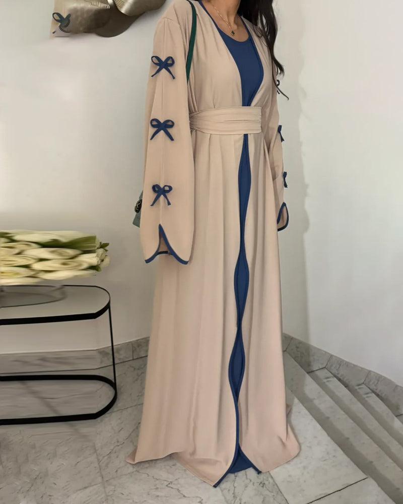 Women's elegant bow cardigan and dress two-piece set in versatile neutral tones with coordinated design