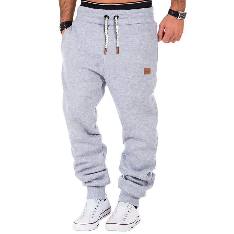 Men's gray fleece sweatpants with drawstring elastic waistband, relaxed fit for all-day comfort