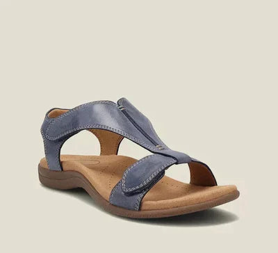 Beige orthopedic sandals with built-in arch support, cushioned sole, and adjustable straps for all-day comfort