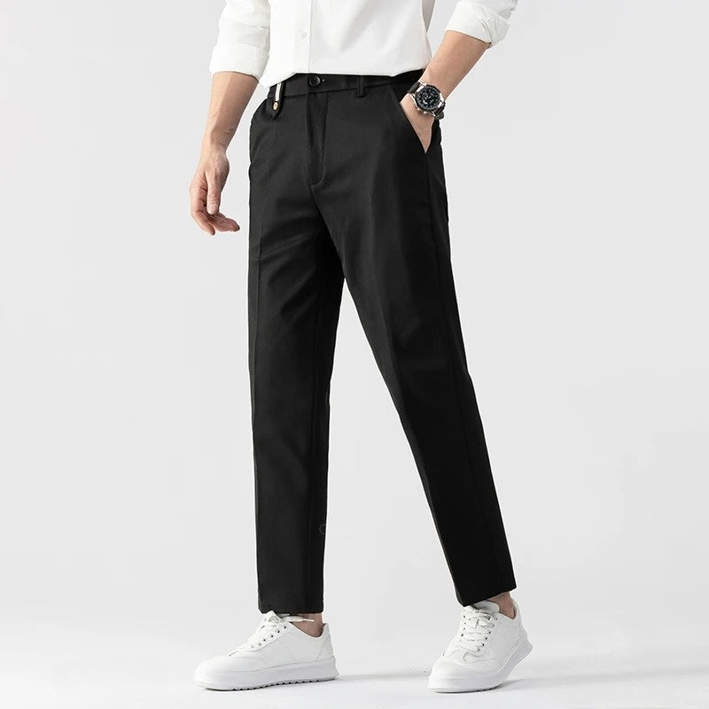 Navy blue straight-leg tailored trousers for professionals with wrinkle-resistant fabric, modern cut