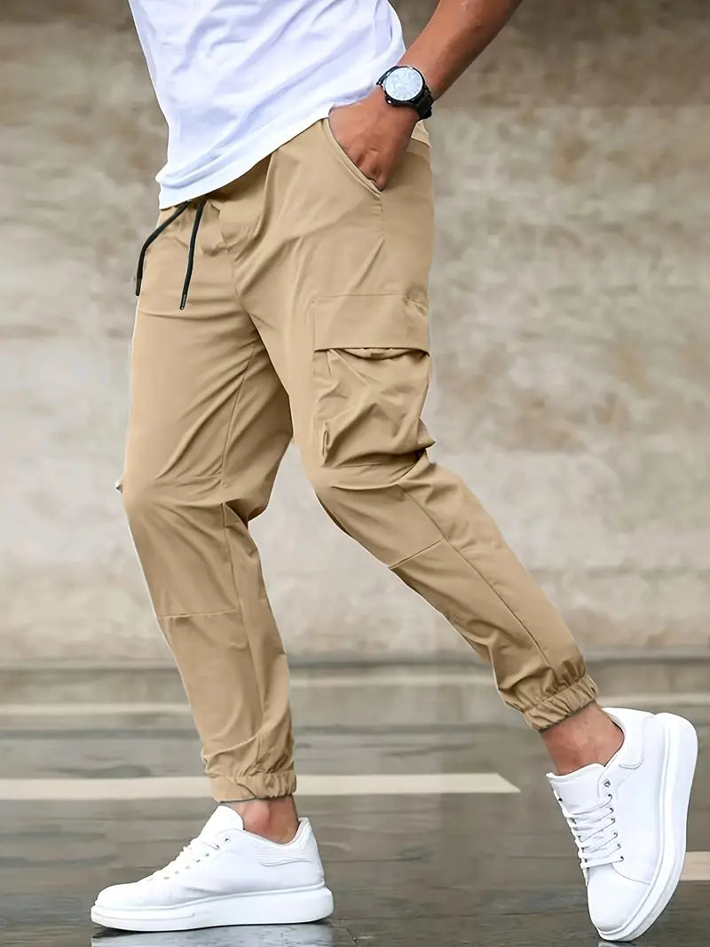 Men's khaki relaxed-fit cargo pants with drawstring waistband and functional side cargo pockets