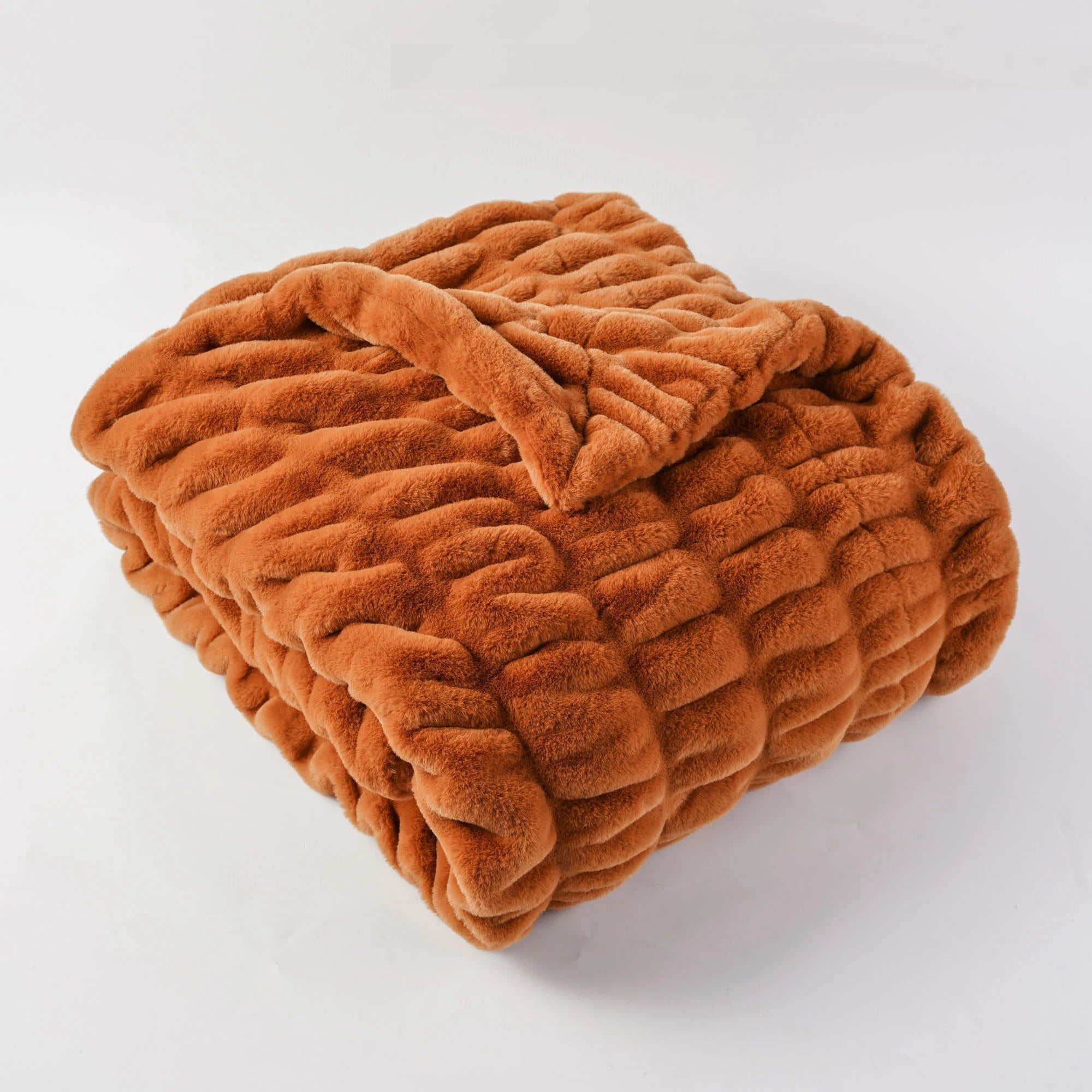 Ultra-soft faux rabbit fur quilted throw blanket in plush textured double-sided ruched design for cozy home decor